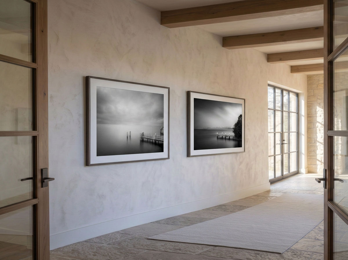 Character-home hallway with three framed vertical prints in a row.